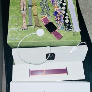 Apple Watch with Colorful Bands and Charger